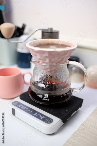 Brew coffee using the Kalita Sagan 101 flat bottom dripper photo