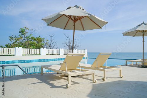 bed pool around swimming pool with sea background © topntp