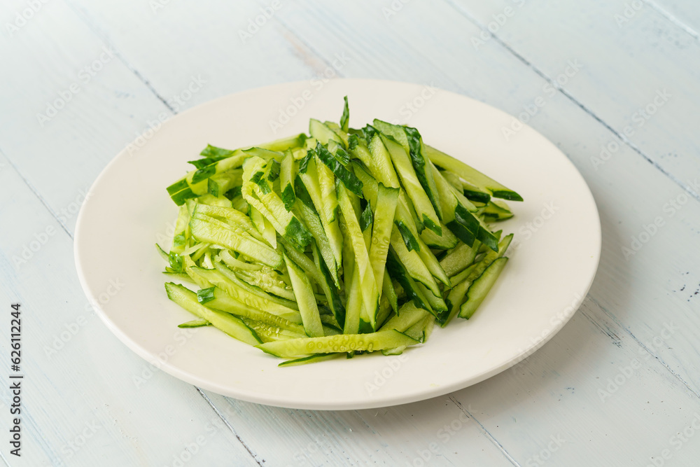 Fresh chopped cucumber isolated on white background Fresh chopped cucumber isolated on white background