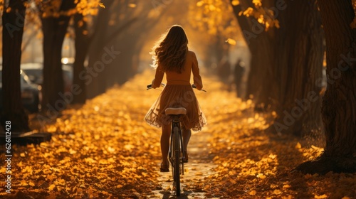Fototapeta Naklejka Na Ścianę i Meble -  person riding bicycle at autumn forest
