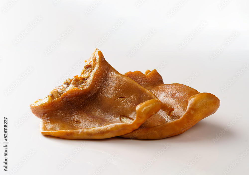 Fresh deli pig ears isolated on white background