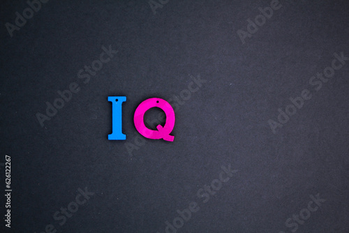the letters of the IQ alphabet or the word intelligence quotient. IQ is a number used to express the apparent relative intelligence of a person