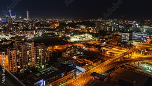 Wallpaper Mural Timelapse landscape video of urban Brisbane City at night with bustling traffic, enchanting light trails that weave through the bustling streets and majestic buildings soaring into the night sky. Torontodigital.ca