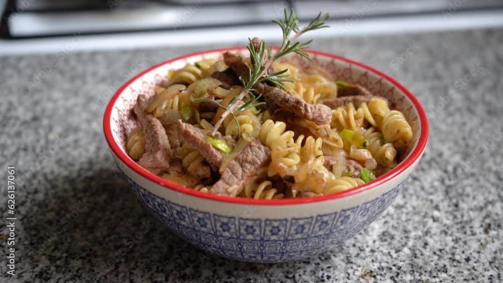 Healthy bowl of pasta with meat. Concept of food made with love at home. Close up zoom in. Healthy bowl of pasta with meat. Concept of food made with love at home. Close up zoom in.