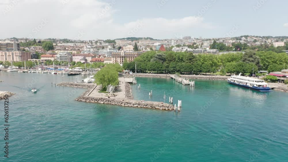 Aerial of harbor with a docked ferry boat in Lausanne, Switzerland