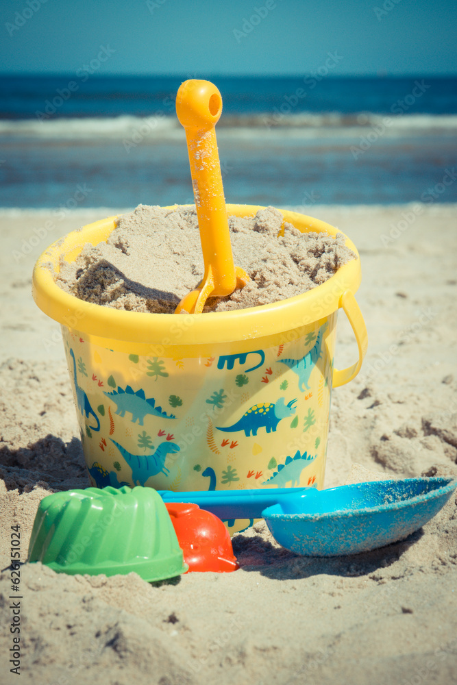 Children toys using for relax and playing at beach. Summer, vacation time and child development Children toys using for relax and playing at beach. Summer, vacation time and child development