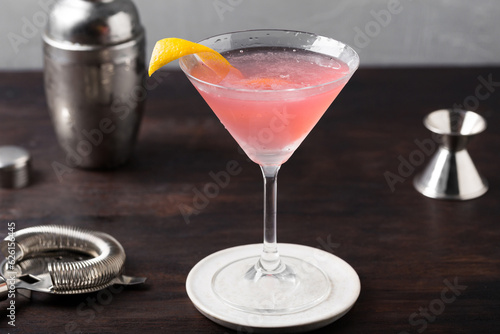 Classic Cosmopolitan Cocktail alcoholic gin, triple sec liqueur, fresh lemon juice and raspberry sugar syrup photo