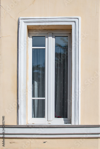 Decorative old windows in red brick houses