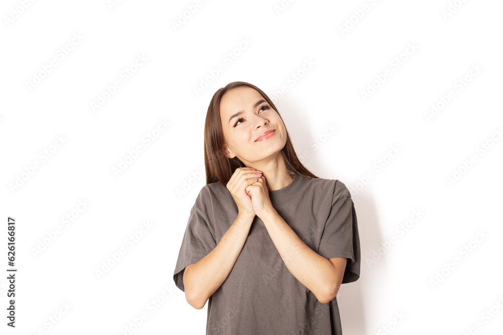 teenager dreaming, student looking up, young woman smiling on white background teenager dreaming, student looking up, young woman smiling on white background