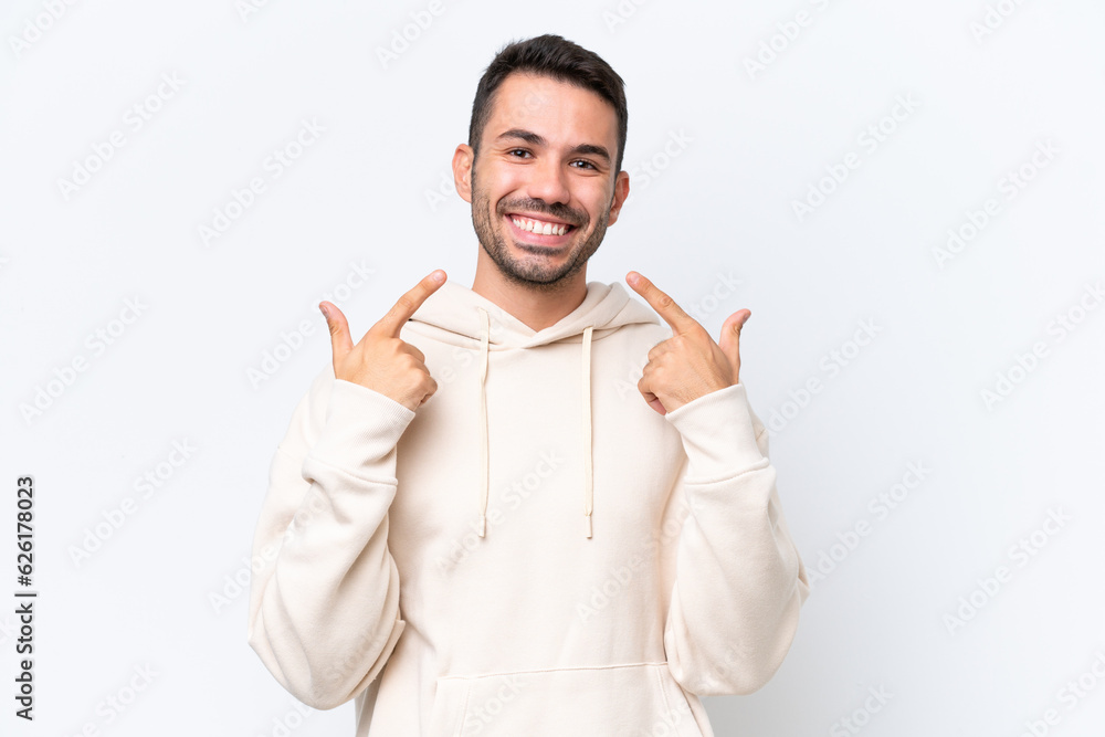 Young caucasian man isolated on white background giving a thumbs up gesture Young caucasian man isolated on white background giving a thumbs up gesture