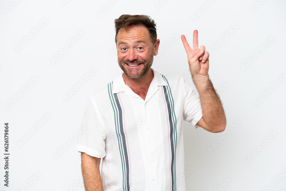 Middle age caucasian man isolated on white background smiling and showing victory sign Middle age caucasian man isolated on white background smiling and showing victory sign