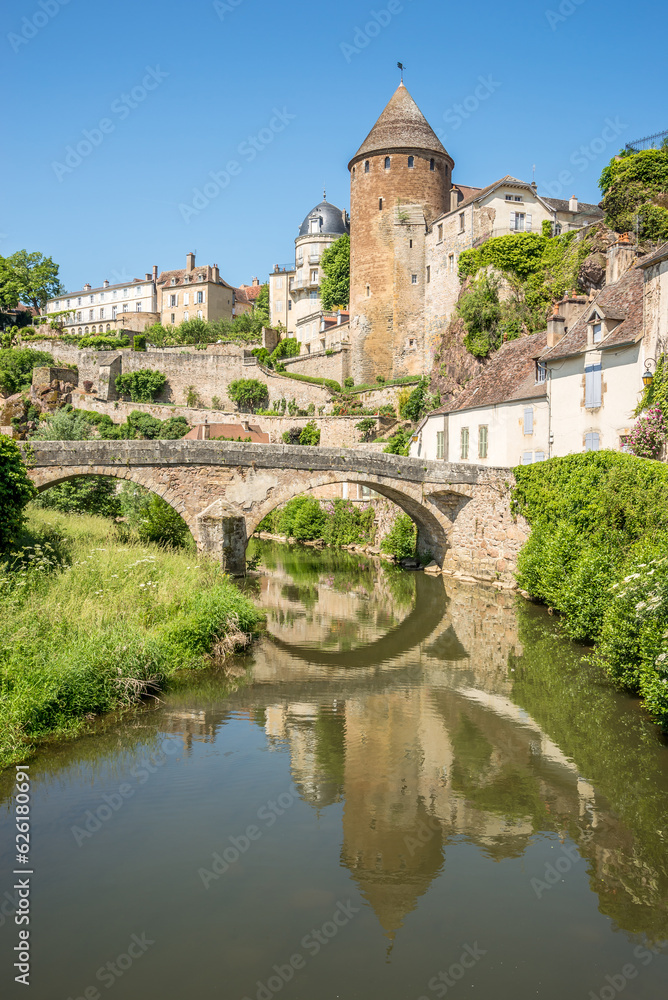View at the Bastion of Fortification with Stone bridge over Armancon river in the streets of Semur en Auxois in France