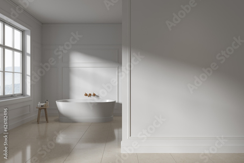 Classic bathroom interior with bathtub  table and window. Mockup wall