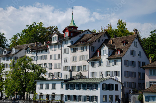 Typical Swiss houses in Zurich on a sunny and cloudy summer day