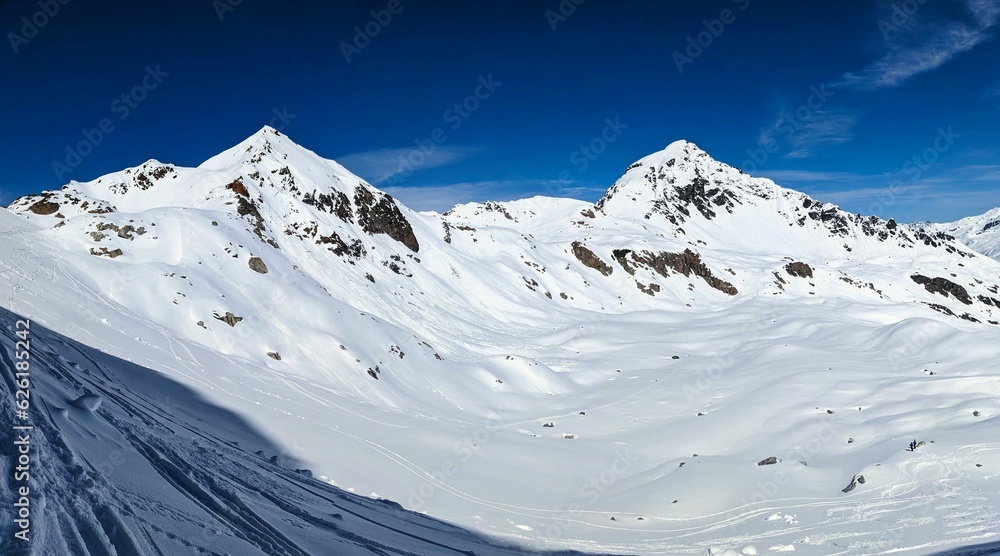 Back country ski tour on the Radüner Rothorn with a view of the Piz Radönt. Ski mountaineering skimo. Davos Klosters Switzerland. High quality photo