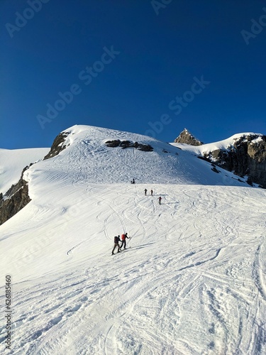 Backcountry Ski tour on the Clariden in Glarus Uri. Skitour over the glacier in the Swiss Alps. Skimo mountaineering. High quality photo