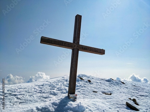 Sustenhorn summit cross. High altitude ski tour over the Steigletscher to the summit. Mountaineering in spring. Skimo. High quality photo. Glacier, on top. photo