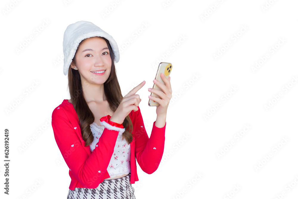 Portrait of pretty Asian teen girl wearing red dress and white hat happily smile using smartphone while working isolated on white background. Portrait of pretty Asian teen girl wearing red dress and white hat happily smile using smartphone while working isolated on white background.