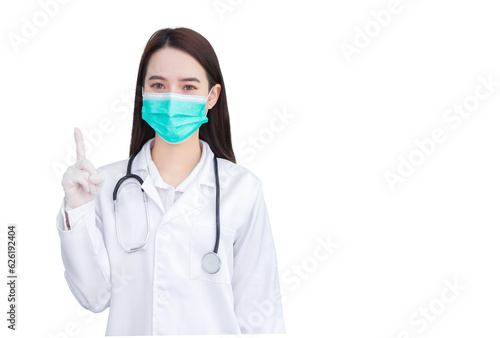Young professional Asian woman doctor who wears medical face mask, rubber glove to protect health is pointing up to present something while working isolated on white background.
