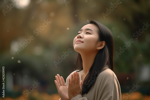 Asian beautiful woman is taking a deep breath in park with good and fresh air and Ozone ,  Generatived AI.