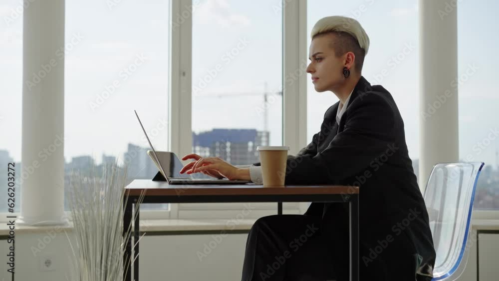 Portrait of Beautiful Authentic LGBT woman in Modern Office with Short ...