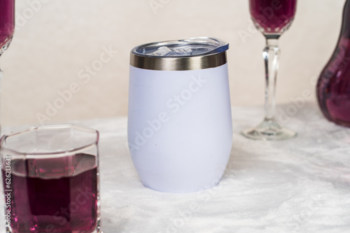 Skillfully executed mockup showcasing a white wine tumbler amid a minimalistic drink arrangement