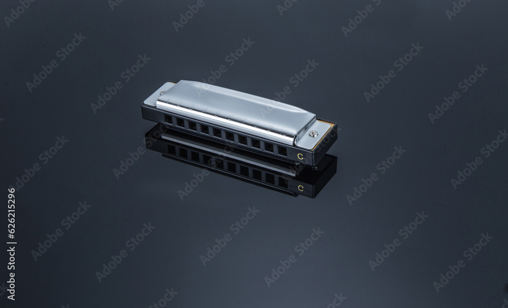 A compact harmonica instrument tool A compact harmonica instrument tool