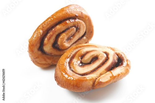 Sweet Temptation: Close-Up of Cinnamon Rolls Placed on a Wooden Surface, Tempting Your Senses in 4K Resolution