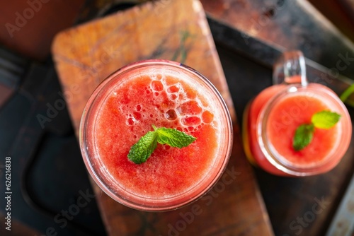 Refreshing Elixir: Close-Up of Fresh Tomato Juice in a Glass, Bursting with Vibrant Flavor and Color in 4K Resolution