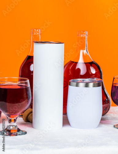 Captivating mockup highlighting a white wine tumbler used for a minimalistic drink arrangement
