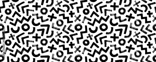 Geometric shapes seamless pattern in Memphis style. Modern banner with bold brush drawn shapes. Abstract fashion trendy vector texture with hand drawn zigzag lines, circles, crosses and triangles.