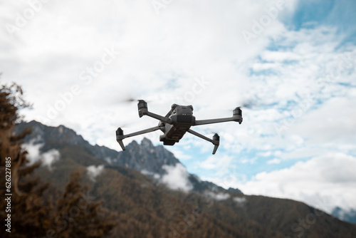 Flying drone in high altitude mountains