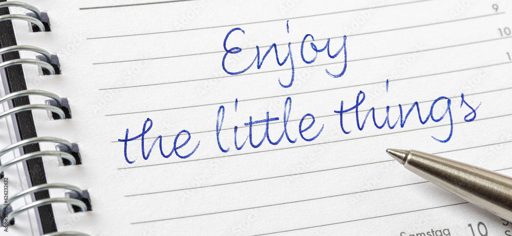 Enjoy the little things written on a calendar page Enjoy the little things written on a calendar page