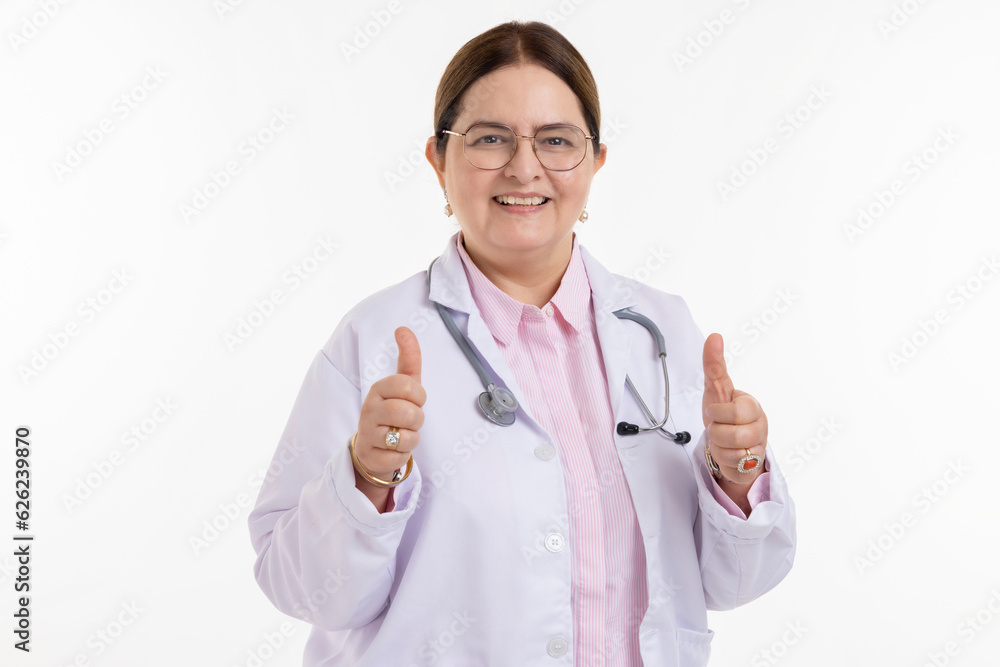 Senior Indian Female Doctor showing thumbs up on white background Senior Indian Female Doctor showing thumbs up on white background