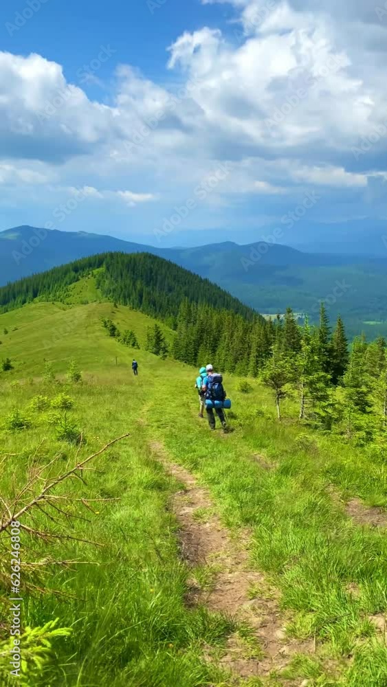 a man, group of tourist with a backpack walks in the mountains, hiking, backpacking, goes to the top, with a big backpack, a travel, a trip to the mountains, a trip, alone with nature, rest, vacation a man, group of tourist with a backpack walks in the mountains, hiking, backpacking, goes to the top, with a big backpack, a travel, a trip to the mountains, a trip, alone with nature, rest, vacation