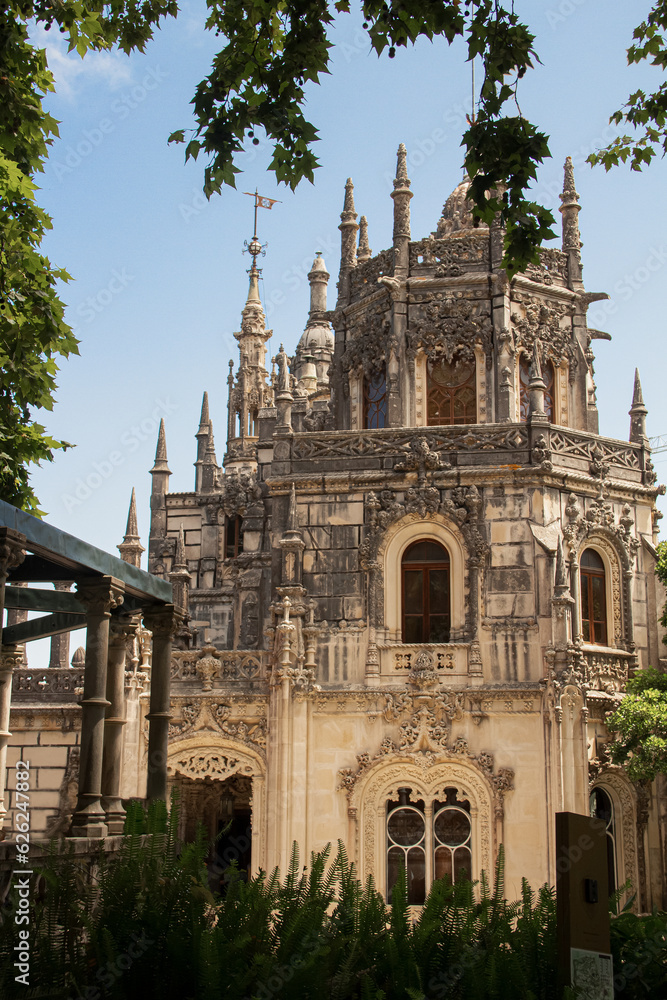Obraz premium Quinta da Regaleira - Beautiful castle in Portugal with cloudy blue sky in Sintra
