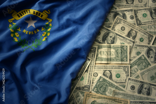 colorful waving national flag of nevada state on a american dollar money background. finance concept