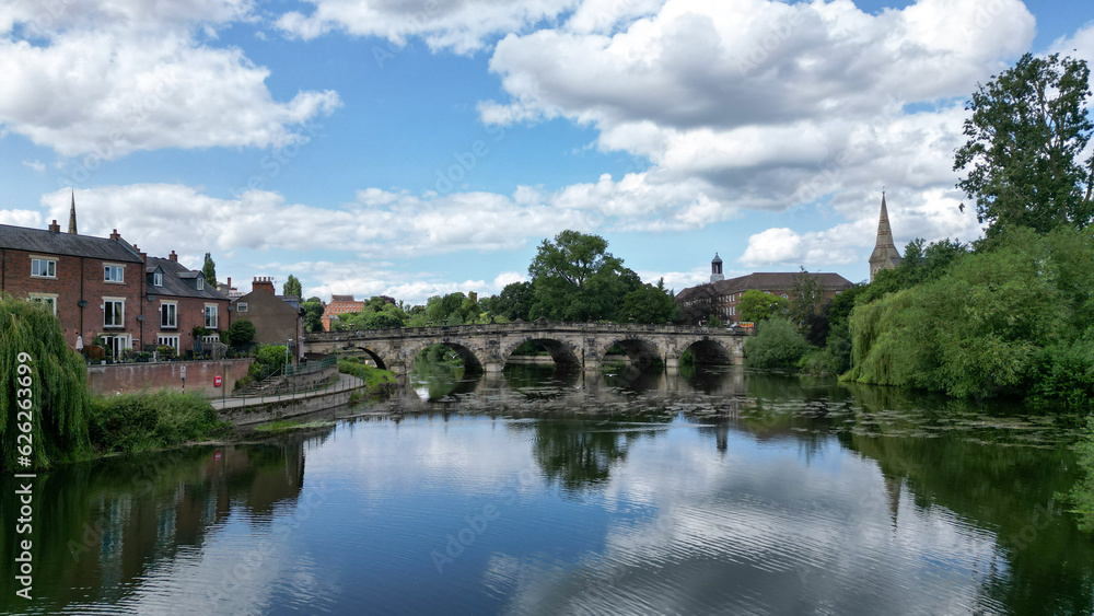 Beautiful historical bridge in a countryside with river reflection. Beautiful historical bridge in a countryside with river reflection.