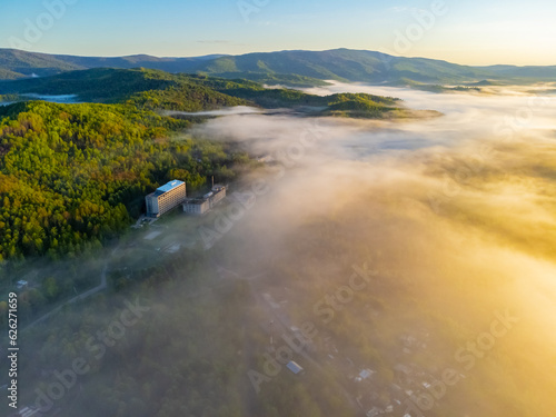 Photos of the hills and the village were taken from a drone in the early morning.  Kuldur is an urban—type settlement in the Irradiation district of the Jewish Autonomous Region of Russia. Resort. 