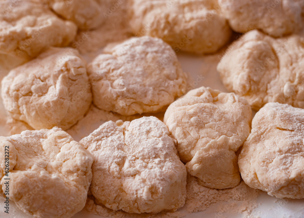 Home made cooking of sweet bakery. Welsh cakes raw dough. Ukrainian traditional bakery of syrnyks. Home made cooking of sweet bakery. Welsh cakes raw dough. Ukrainian traditional bakery of syrnyks.