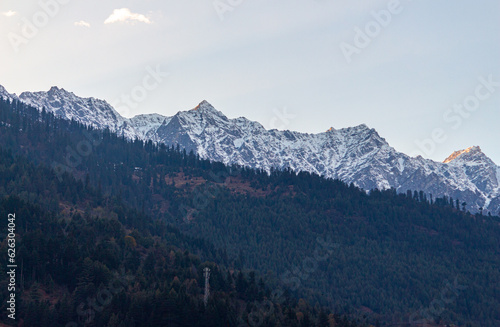 View at Manali  Himachal Pradesh  India. Beas river along side Manali snow mountains Himachal Pradesh  India. Manali is the best destination for honeymoon and holidays. Green nature in Manali  India.