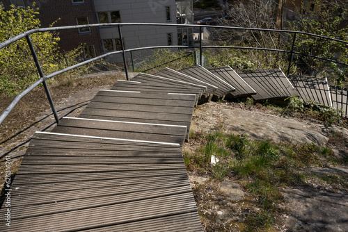 Wooden stairs built and fitted to a cliffside.