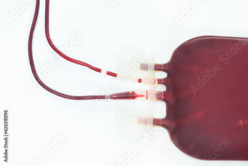 Blood pack for transfusion from donor.Full blood bag for accident's patient on white background in blood bank unit at laboratory.Safe life concept.