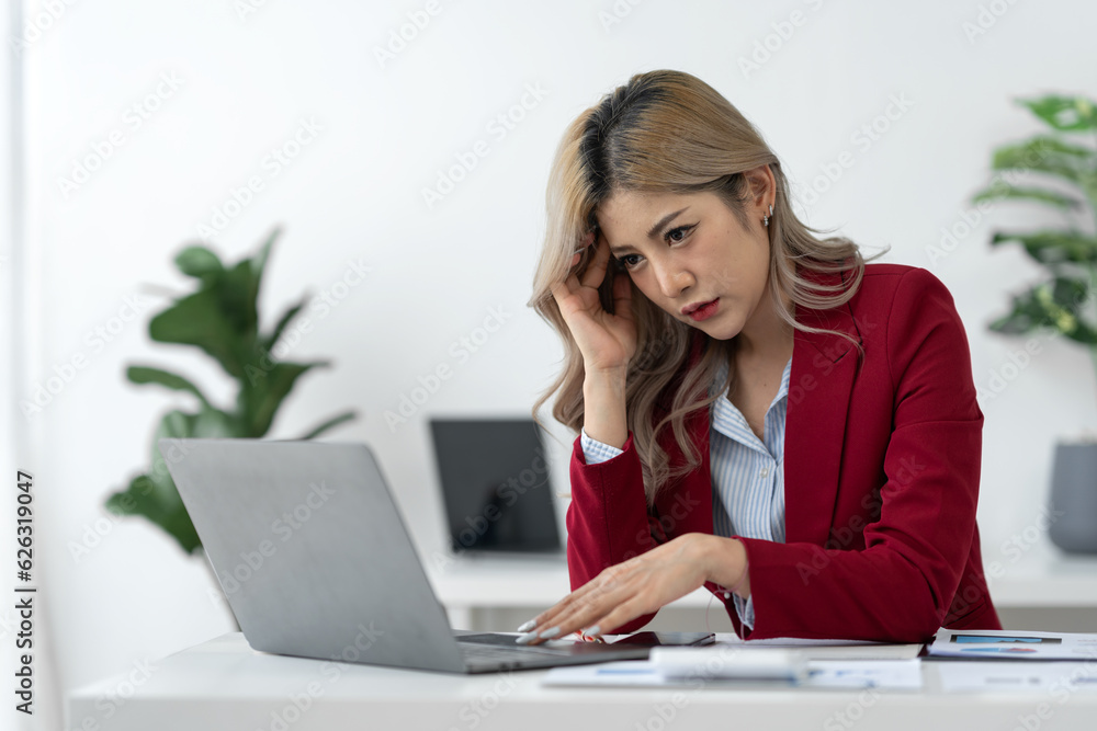 tired business woman sleepy and bored from sitting at a desk for a long time and has office syndrome tired business woman sleepy and bored from sitting at a desk for a long time and has office syndrome