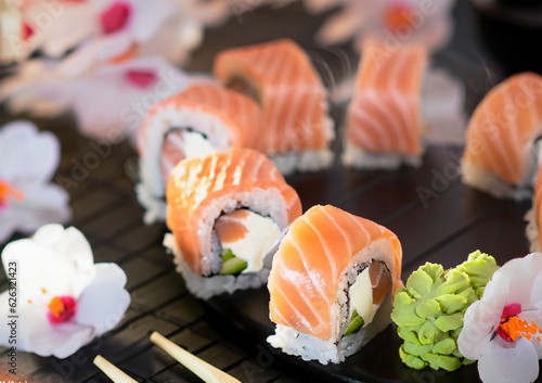 sushi with salmon on a plate