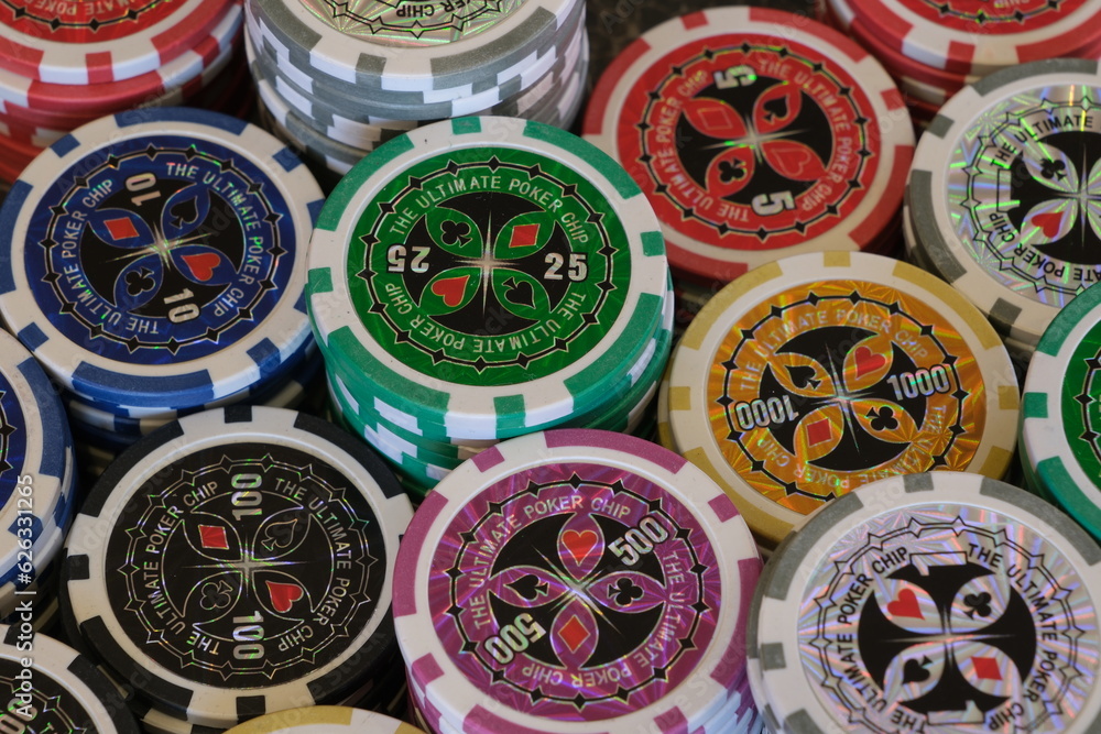 Obraz premium Poker chips piled up on table