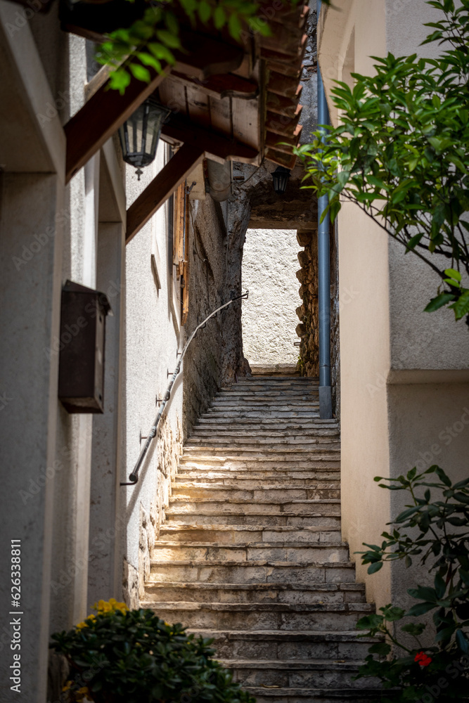 Beautiful, narrow, stone staircase in the mediterranean town of Brsec, Croatia, located on the shore of istrian peninsula