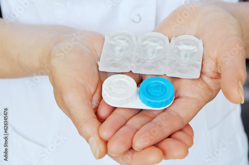 Contact Lens Care.Medical worker holding a blister with contact lenses.Eye Care And Vision Concept.