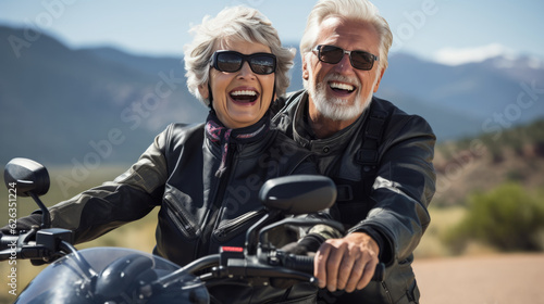 An elderly couple riding a motorcycle.