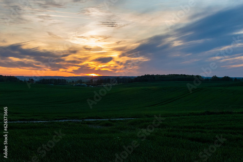sunset in the field © Grzegorz